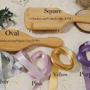 May include: Two wooden hairbrushes, one oval and one square, with measurements in inches and centimetres. The image also shows silver, pink, yellow, and purple ribbons. The words "Square" and "Oval" are printed on the image.