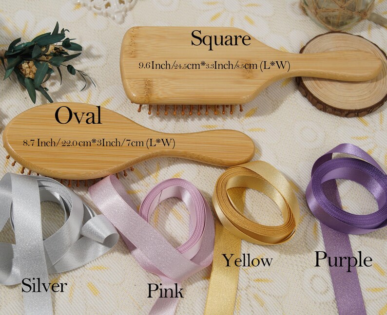 May include: Two wooden hairbrushes, one oval and one square, with measurements in inches and centimetres. The image also shows silver, pink, yellow, and purple ribbons. The words "Square" and "Oval" are printed on the image.