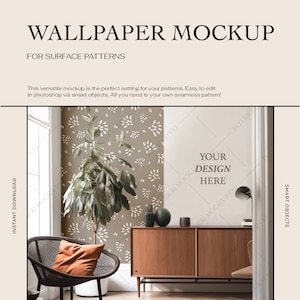 May include: A mockup of a living room interior with a brown dresser, a black wicker chair with an orange pillow, a potted plant, and a wall with a white floral pattern. The text "YOUR DESIGN HERE" is on the wall.