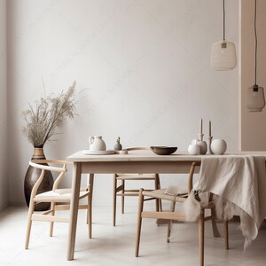 May include: A minimalist dining room scene featuring a light wood table and chairs. The table is set with white ceramic pieces, candles, and a wooden bowl. A large vase with dried plants and two pendant lights complete the neutral-toned decor.