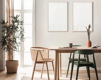 May include: A dining room with a wooden table and chairs. Two framed pictures hang on the wall behind the table. A potted plant is in the corner of the room.