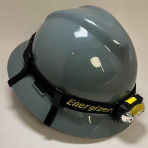 Onbreekbare MSA V-Gard-koplampclip met volledige rand, clip voor veiligheidshelmverlichting, helmaccessoire, koplamphouder, op rand gemonteerd.
