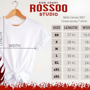 May include: White t-shirt hanging on a wooden hanger, with a size chart for Bella Canvas 3001 Unisex Jersey T-shirts. The chart shows sizes XS to 3XL, with length and width measurements in inches. The brand name "ROSSOO STUDIO" is at the top.