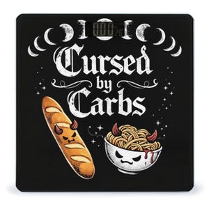 May include: A black digital bathroom scale with the text "Cursed by Carbs" in white. The scale features illustrations of a baguette and a bowl of pasta, both with devil horns. The digital display shows a weight of 26.