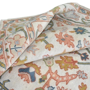 Hand-Knotted Oushak Rug: Beige, Orange, & Green Wool Area Rug