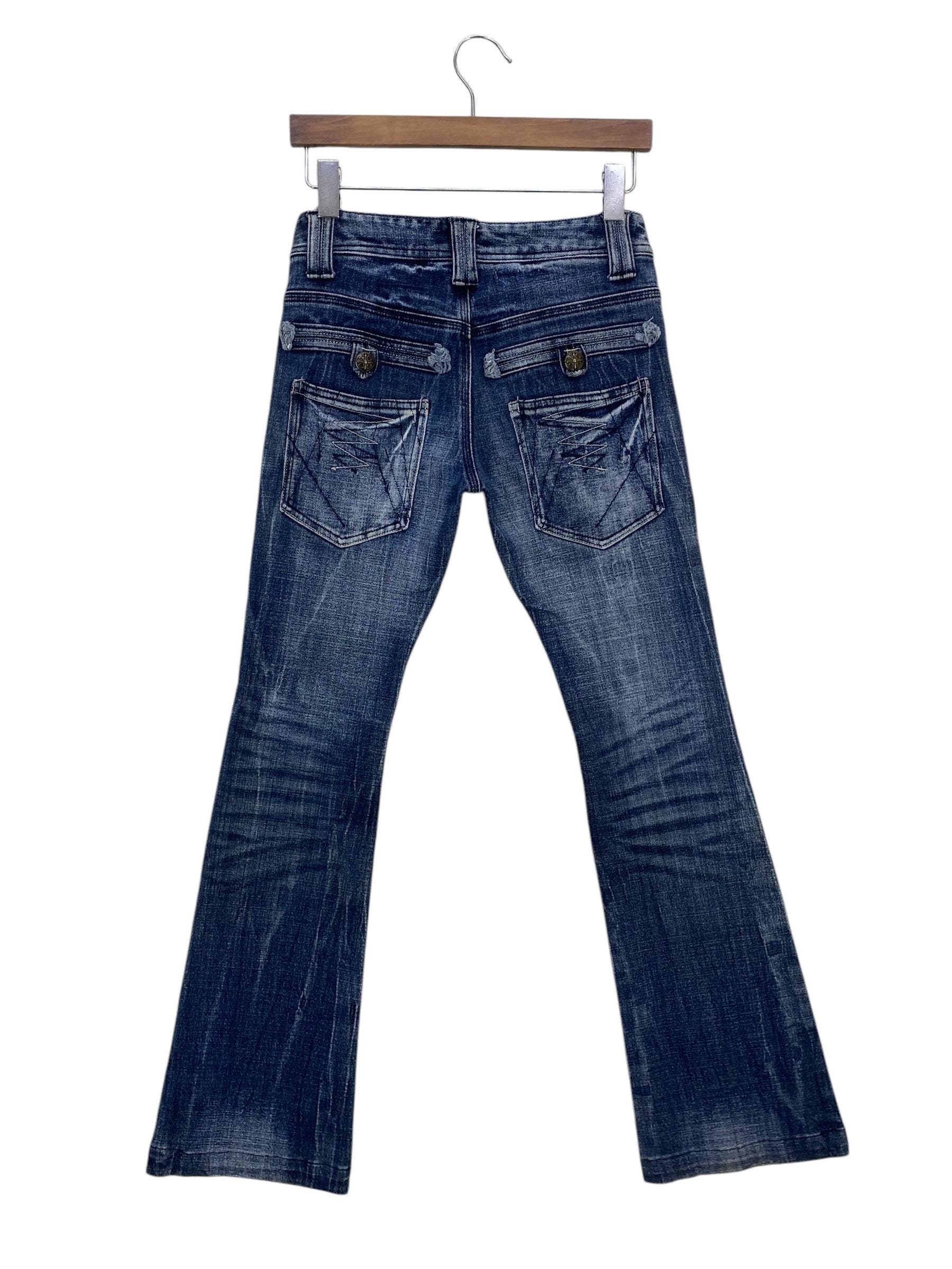 Jeans bootcut BCBG Denim svasato effetto consumato, taglia 25