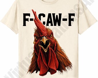 May include: Cream-colored t-shirt featuring a detailed illustration of a rooster's head with open beak and red comb. Bold black text above the rooster reads "F-CAW-F". The rooster's feathers are brown and red.