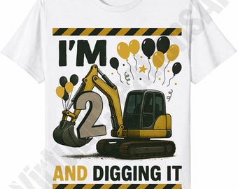 May include: White t-shirt with a yellow and black excavator graphic, the number 2, and the text "I'M AND DIGGING IT". The design includes yellow and black balloons, and a star. A fun birthday shirt for a two-year-old.
