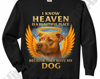May include: Black sweatshirt with a graphic of a brown dog with a halo and golden wings. The text reads "I KNOW HEAVEN IS A BEAUTIFUL PLACE BECAUSE THEY HAVE MY DOG."