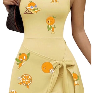 character with orange dress 13 Iconic '90s Cartoon Character Outfits Recreated