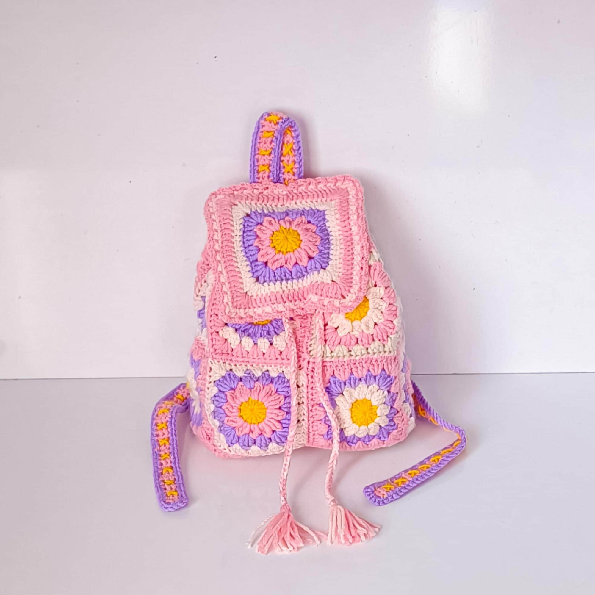 crochet mini backpack written pattern PDF Up the nostalgic vibes by hooking this Mini Backpack Crochet Pattern in Parma Violets lilac 24 Free Crochet Backpack Patterns