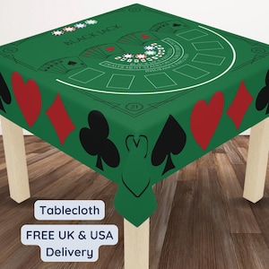 May include: Green tablecloth with a blackjack table design. The tablecloth features playing card suits and the words "Black Jack".