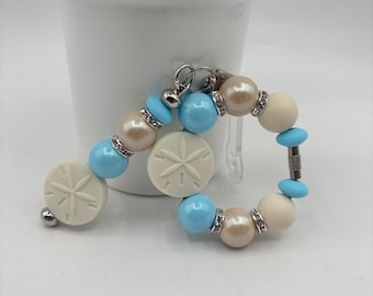 Accesorios de la Copa Stanley, pulseras con asas de dólar de arena, colgantes de paja con dijes, temática veraniega de playa y océano.