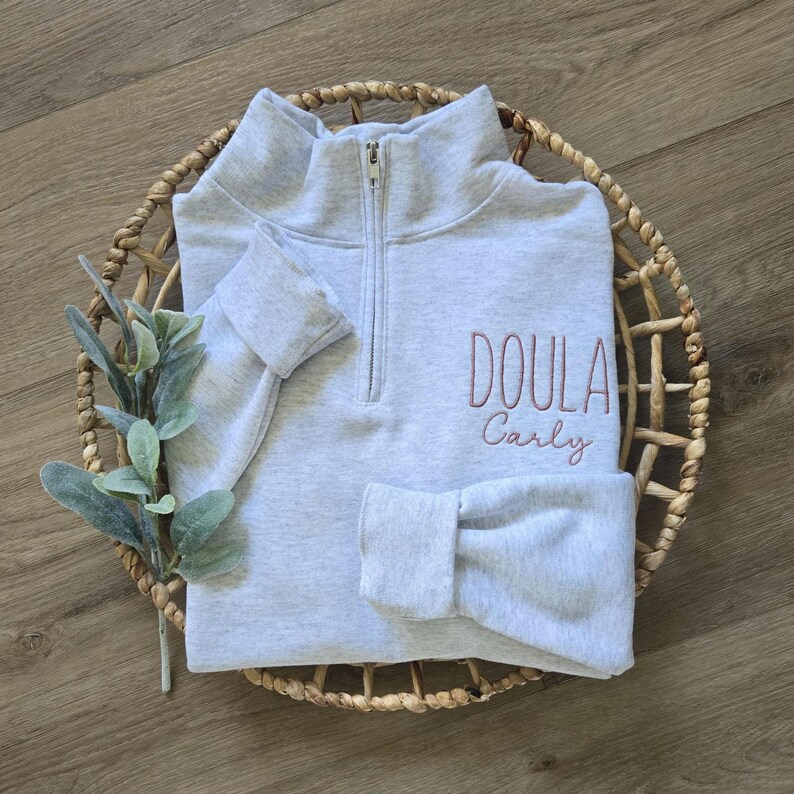 An ash sweatshirt with mauve thread.