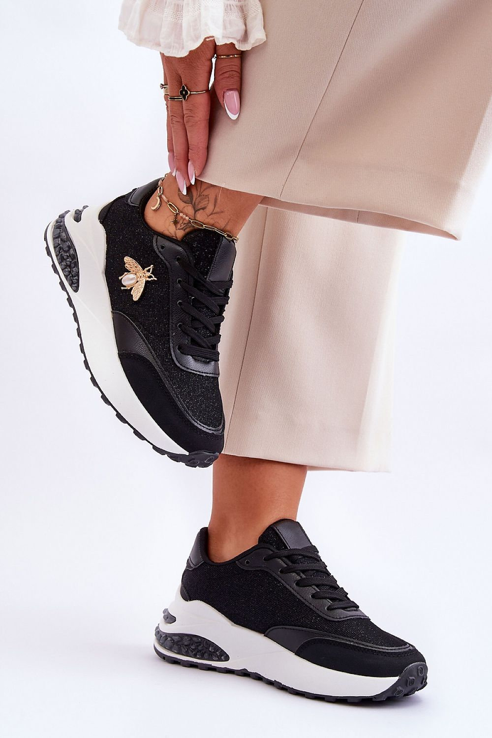 womens black gold trainers