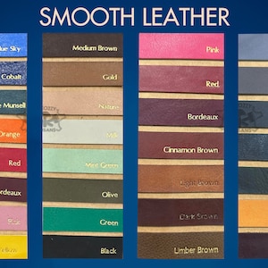 May include: A chart displaying 20 different colours of smooth leather. The colours are arranged in rows of four. The colours are: Blue Sky, Cobalt, Blue Munsell, Orange, Red, Bordeaux, Rose, Yellow, Medium Brown, Gold, Nature, Milk, Mint Green, Olive, Green, Black, Pink, Red, Bordeaux, Cinnamon Brown, Light Brown, Dark Brown, Umber Brown, Ston, Gray, Black, Dark Blue, Dark Green, Orange, Violet.