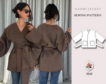 May include: A brown jacket with long sleeves, a V-neckline, two front pockets, and a matching tie belt. The edges are finished with brown piping. The image includes a technical line drawing of the Naomi Jacket sewing pattern and PDF text.