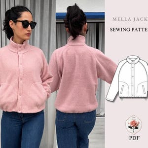 May include: A light pink fleece jacket with a high collar, snap button front closure, and two front pockets. The image includes a technical line drawing of the Mella Jacket sewing pattern with the text Mella Jacket Sewing Pattern PDF.