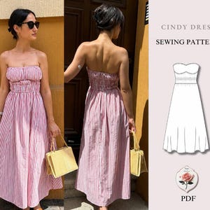 Peut inclure: Une robe longue sans bretelles à rayures verticales rouges et blanches, dotée d'un corsage froncé et d'une taille cintrée. L'image présente un dessin technique du patron de couture Cindy Dress avec le texte PDF indiqué en bas.