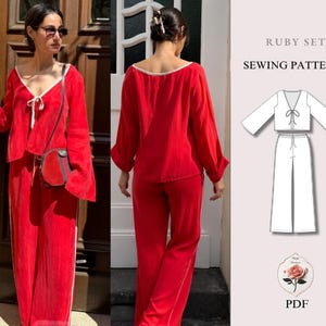 May include: A Ruby Set sewing pattern featuring a red long-sleeved top with a V-neckline and tie closure, paired with matching red wide-leg trousers. The set includes a white line drawing illustration of the garment and the text Ruby Set Sewing Pattern PDF.