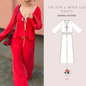 May include: A sewing pattern for a tie top and wide leg pants. The pattern includes a line drawing of the garment and a photo of a woman wearing the finished garment. The garment is red.