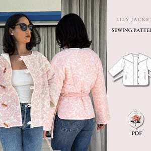May include: A quilted jacket with a pink and white paisley pattern, featuring a round neckline, long sleeves, and wooden toggle closures. The design includes a matching tie belt. Text reads LILY JACKET SEWING PATTERN and PDF with a rose illustration.