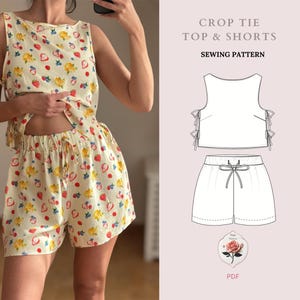 May include: A sewing pattern for a crop top and shorts. The pattern includes a tie detail on the top and a drawstring waist on the shorts. The pattern is available as a PDF download.