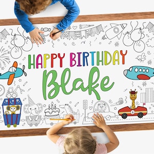 May include: A large white coloring poster with a colorful "Happy Birthday Blake" banner and various black and white illustrations of animals, vehicles, and objects. The poster is designed for children to color in.