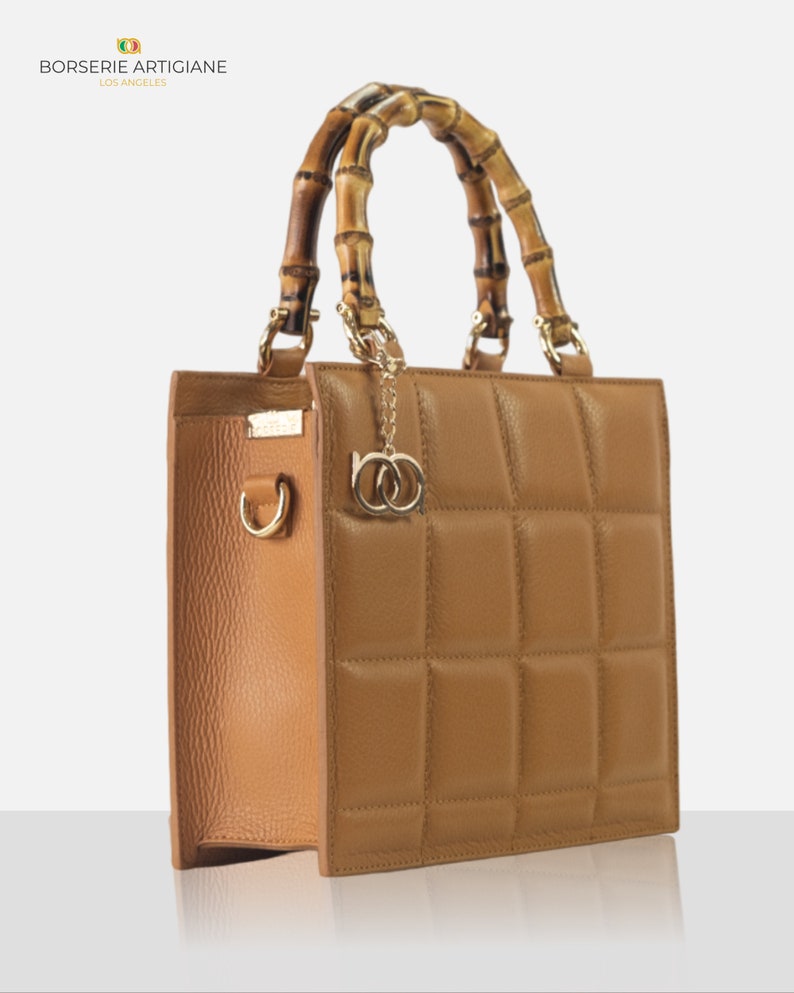 Top handle stylish Italian Handbag with matching pattern strap and bamboo handle. Genuine italian leather. Natural Leather