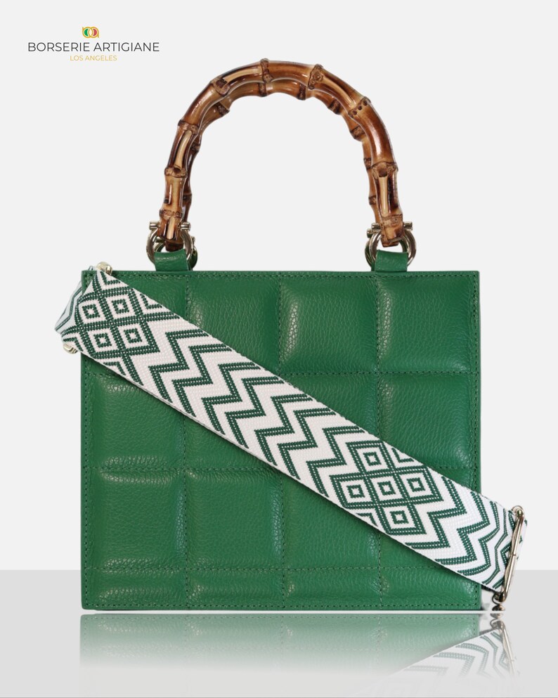 Top handle stylish Italian Handbag with matching pattern strap and bamboo handle. Genuine italian leather. Green