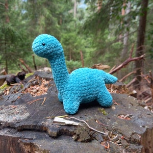 Dinosauro di peluche all'uncinetto immagine 1