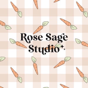 May include: A light pink and white gingham background with a pattern of orange carrots. The text "Rose Sage Studio" is in the centre of the image.
