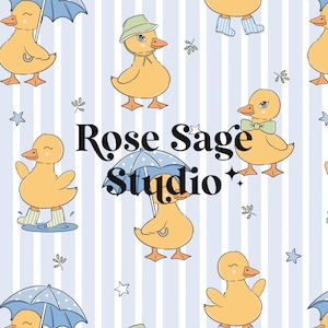 May include: A repeating pattern featuring cartoon ducks in various poses, some with umbrellas or rain boots, set against a light blue and white striped background. The text "Rose Sage Studio" is prominently displayed in the center.