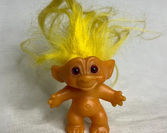 Poupée Troll banalisée vintage, cheveux jaunes, yeux en spirale violets, probablement années 1960