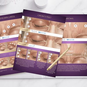 May include: Three purple and white informational brochures with diagrams of facial muscles and the words "Glabella (Frown Lines)", "Crow's Feet", and "Brows". A gold pen rests on the brochures. The brochures are on a white surface.