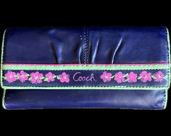 Coach Wallet blue painted leather with floral motif,  glove tanned leather. Clean neat cute and a one of a kind.