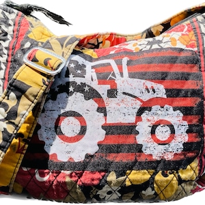 A Vera Bradley with an American Farmer Purse, a one and only!! Super clean restyled handbag that we think looks way better! unique tractor