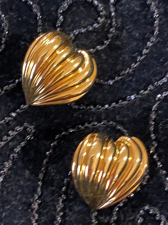 Vintage puffy heart clip on earrings marked AVON r