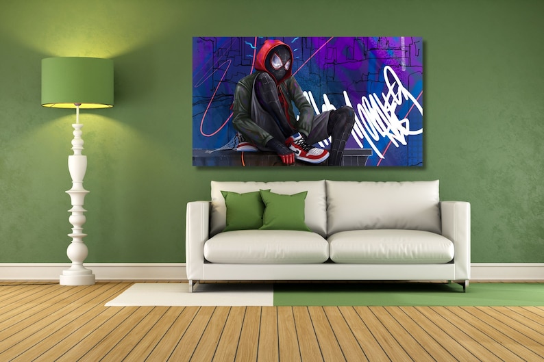 May include: A digital illustration of a superhero wearing a black and red suit with a red hood. The superhero is sitting on a ledge with a city background. The image has a graffiti style.
