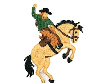 May include: An embroidered patch featuring a rider in a green shirt and black hat mounted on a rearing tan horse with a black mane and tail. The rider wears brown chaps and is depicted with one arm raised while riding the bucking horse.
