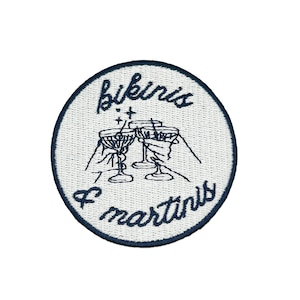 May include: A set of three ceramic mugs with a speckled, matte finish. The mugs are in shades of cream, light gray, and dark gray. Each mug has a simple, minimalist design, perfect for coffee or tea.