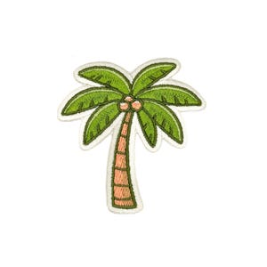 May include: Embroidered patch of a green palm tree with a light brown trunk and coconuts. The patch has a white border on a white background. The design is detailed and colourful, suitable for clothing or accessories.