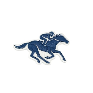 May include: Embroidered patch featuring a navy blue racehorse and jockey in motion. The patch has a white border and is designed with detailed stitching. Ideal for adding to jackets, bags, or other fabric items.