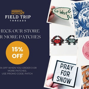 May include: A collection of embroidered patches featuring various designs including a green arrow with the text Go West, a blue UFO scene with Leave No Trace, red and blue crabs, a pink circle with a cowboy boot, and white text reading PRAY FOR SNOW.