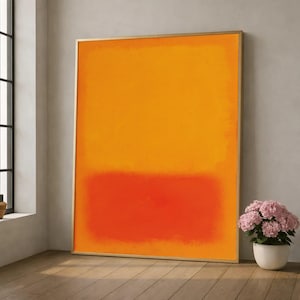 Puede incluir: Una gran pieza de arte mural rectangular que presenta una sección superior de color naranja vibrante y una sección inferior de color rojo sólido, encerrada en un marco dorado fino. La pintura muestra una composición de campos de color.
