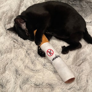 Cat kicker cigarette catnip toy