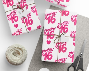 May include: White gift wrap with a repeating pattern of the words "Sweet 16" in pink, along with pink hearts. The gifts are tied with twine and adorned with heart-shaped tags. A spool of twine and scissors are also present.