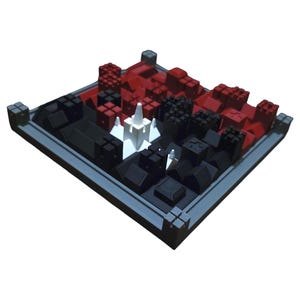 May include: A square board game featuring a grid of small, three-dimensional building structures in red, black, and white. The board has a raised gray border with corner details. The structures include various house and tower shapes arranged in rows.