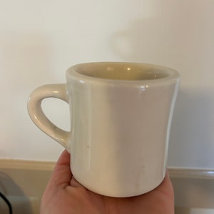 Rego stoneware off white mugs