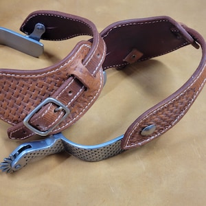 Custom hand made lined spur straps.